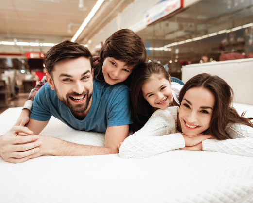 Family shopping for mattresses
